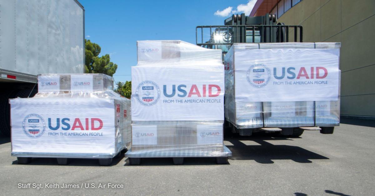 USAID-branded pallets of humanitarian aid.