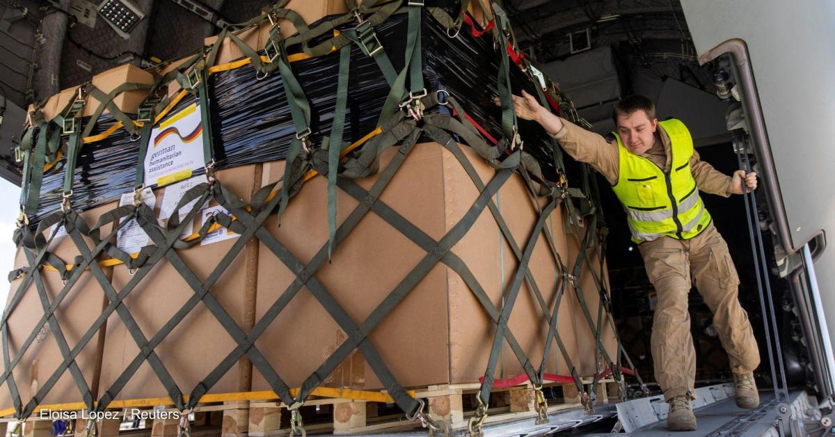 A worker unloads humanitarian aid from Germany for victims of the earthquake in 
Turkey in 2023.